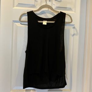 Dance Department Black Tank Top. Uneven hem (shorter in front). Size S. NWOT.